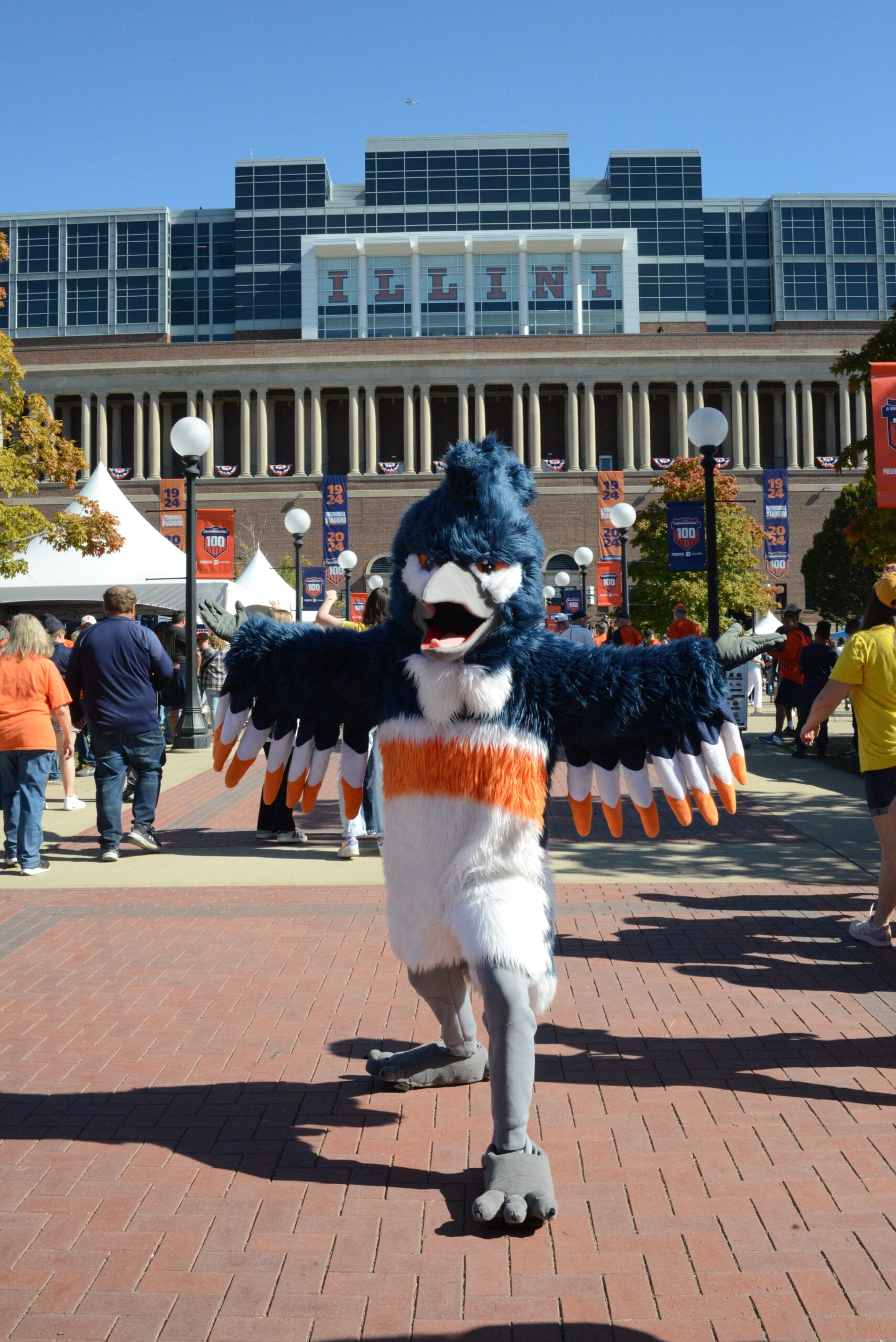The Belted Kingfisher mascot posing outside of Memorial Stadium