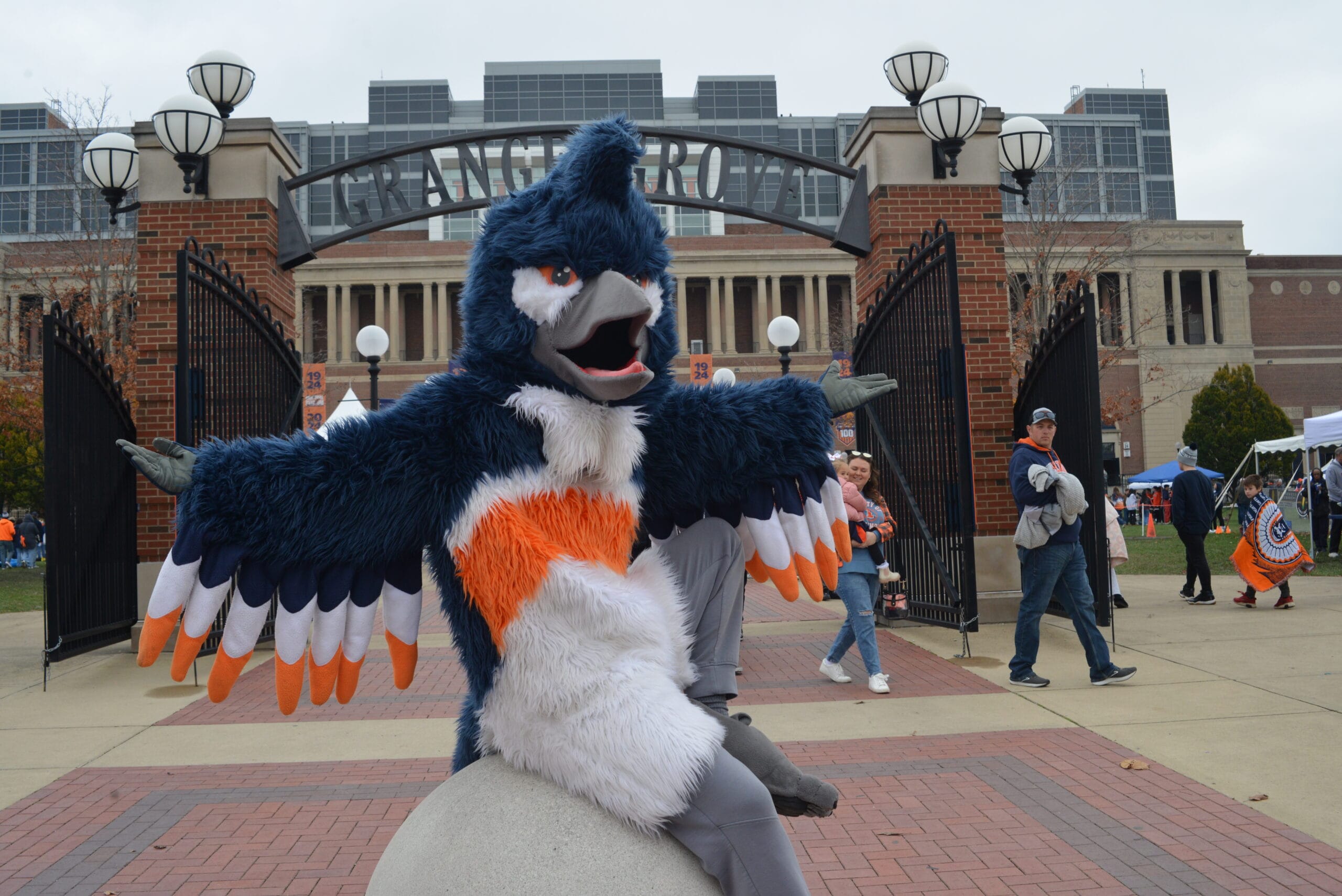 The Belted Kingfisher mascot posing at the entrance to Grange Grove
